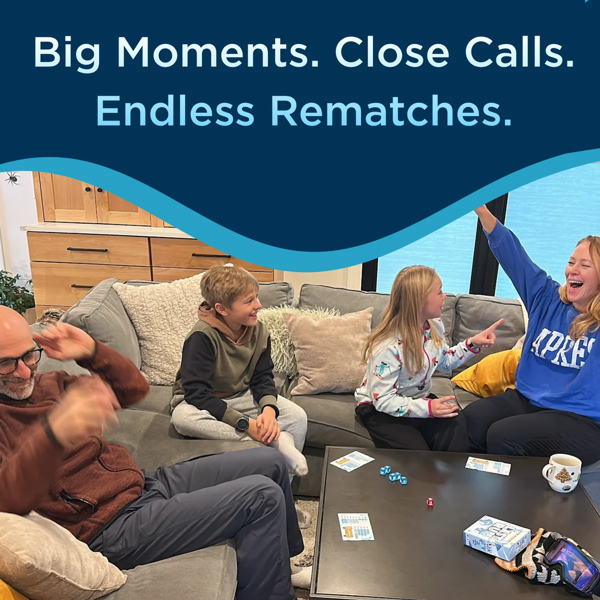 Family playing the Last Run dice game together and celebrating a winning roll